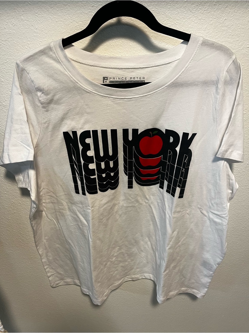 Prince Peter Collection White Tee with Black 'New York' Graphic and Red Apple